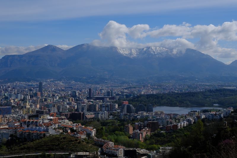 Tirana City And Mount Dajti Under A Blue Sky