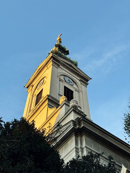 Free Upward view of Saint Michael's Cathedral tower in Belgrade during sunset with a clear sky. Stock Photo