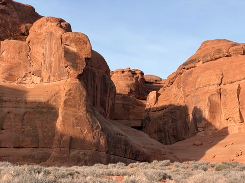 Free Stunning view of sandstone cliffs with a clear blue sky, showcasing natural desert beauty. Stock Photo