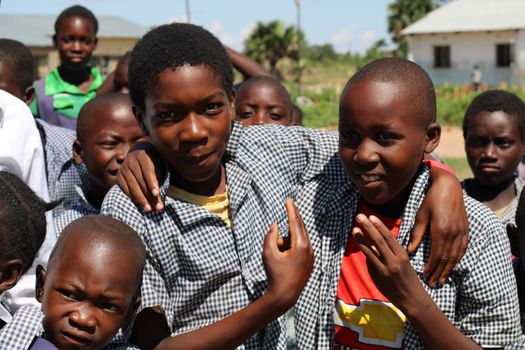 Group of happy children enjoying a sunny day outdoors in Zambia.