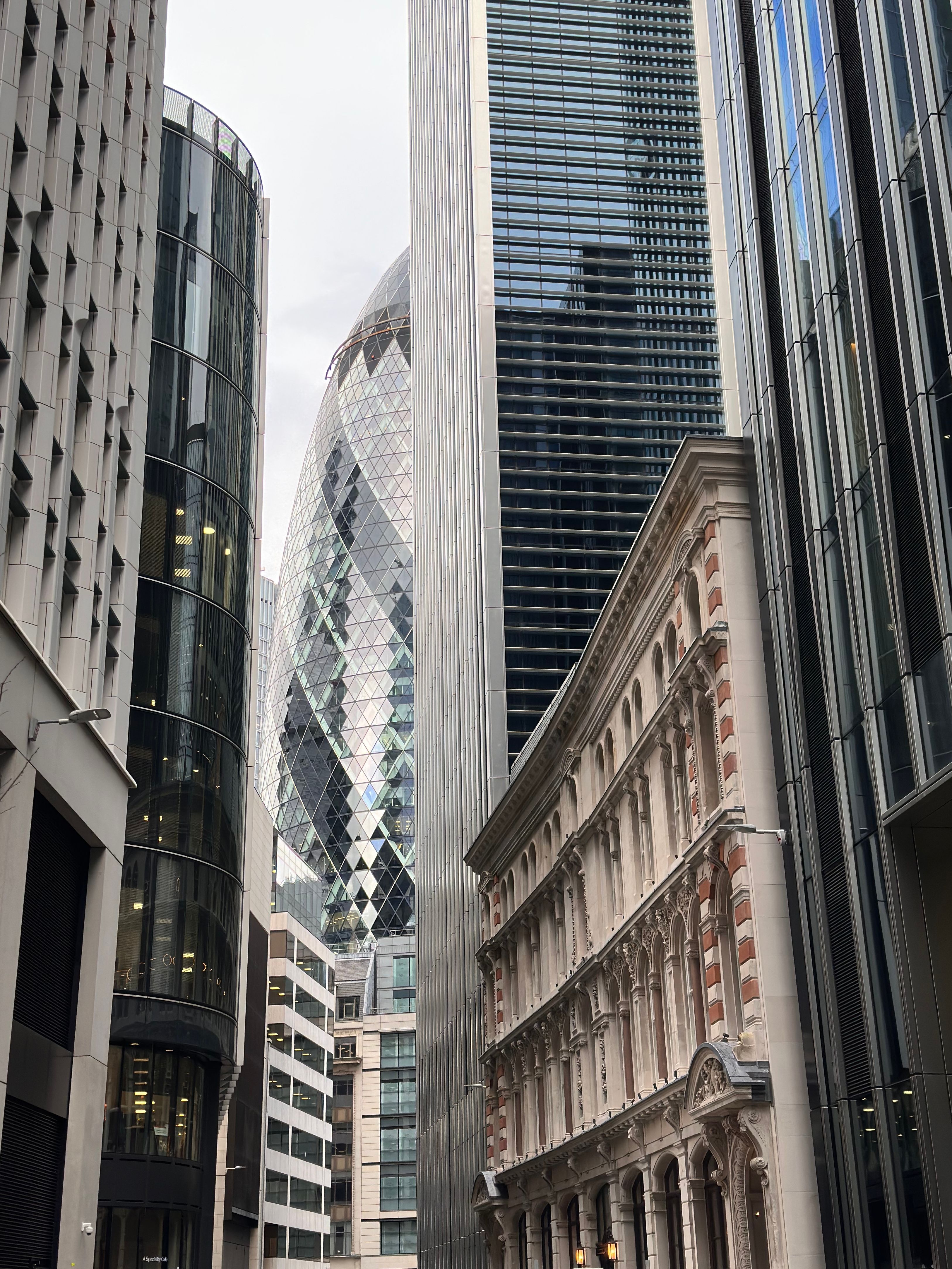 Modern architecture featuring the Gherkin building in London's financial district.