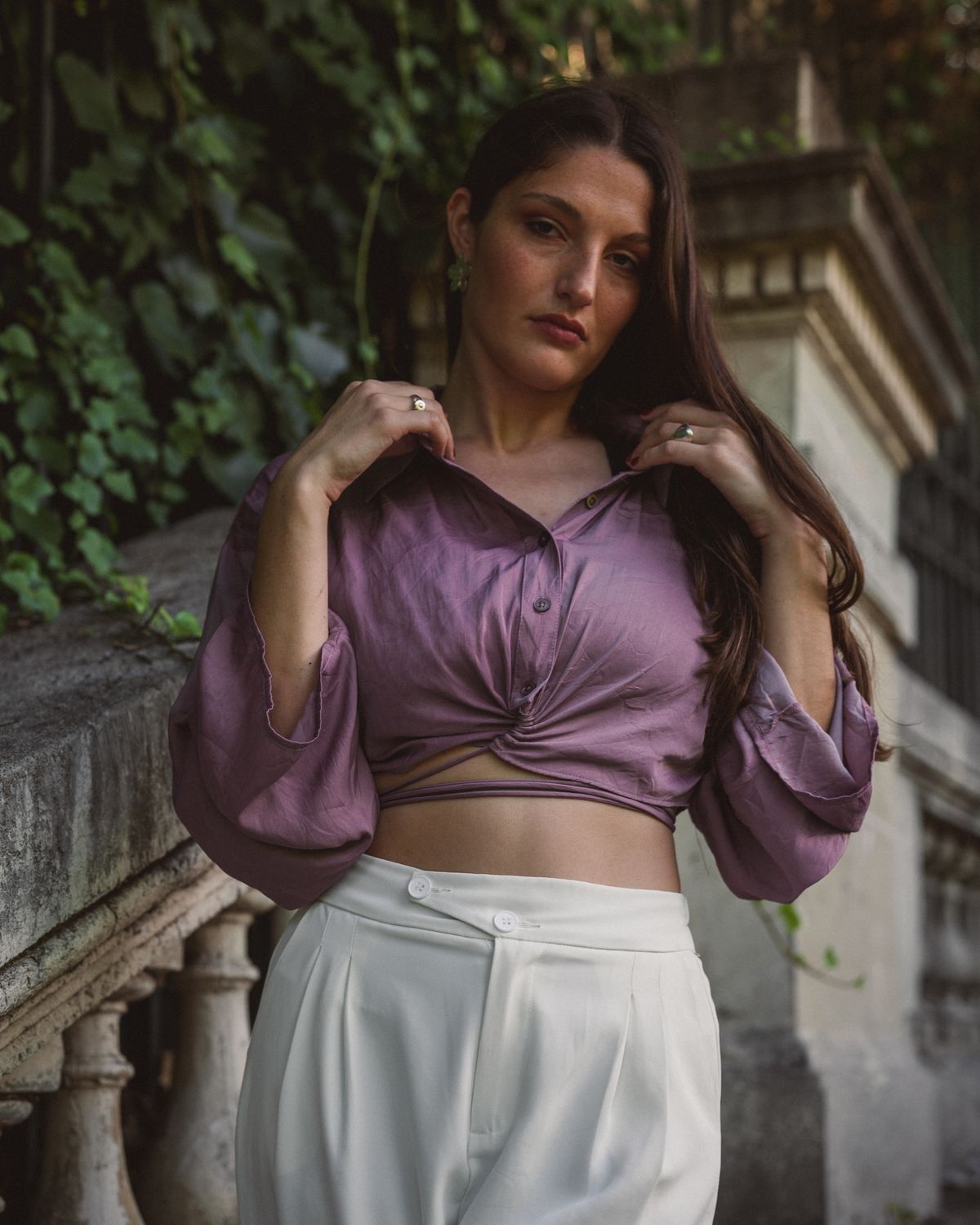 Stylish Woman Posing Outdoors in Elegant Attire · Free Stock Photo