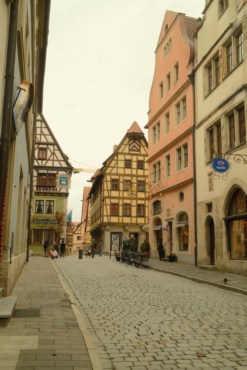 Free Idyllic view of Rothenburg ob der Tauber's historic street with traditional German architecture. Stock Photo