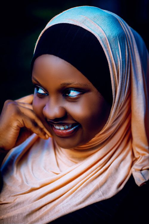 Free Beautiful portrait of a woman wearing a hijab and smiling joyfully. Stock Photo
