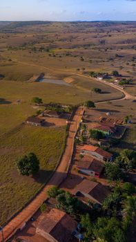 Scenic aerial view of a rural village and countryside in Alagoas, Brazil during daytime.
