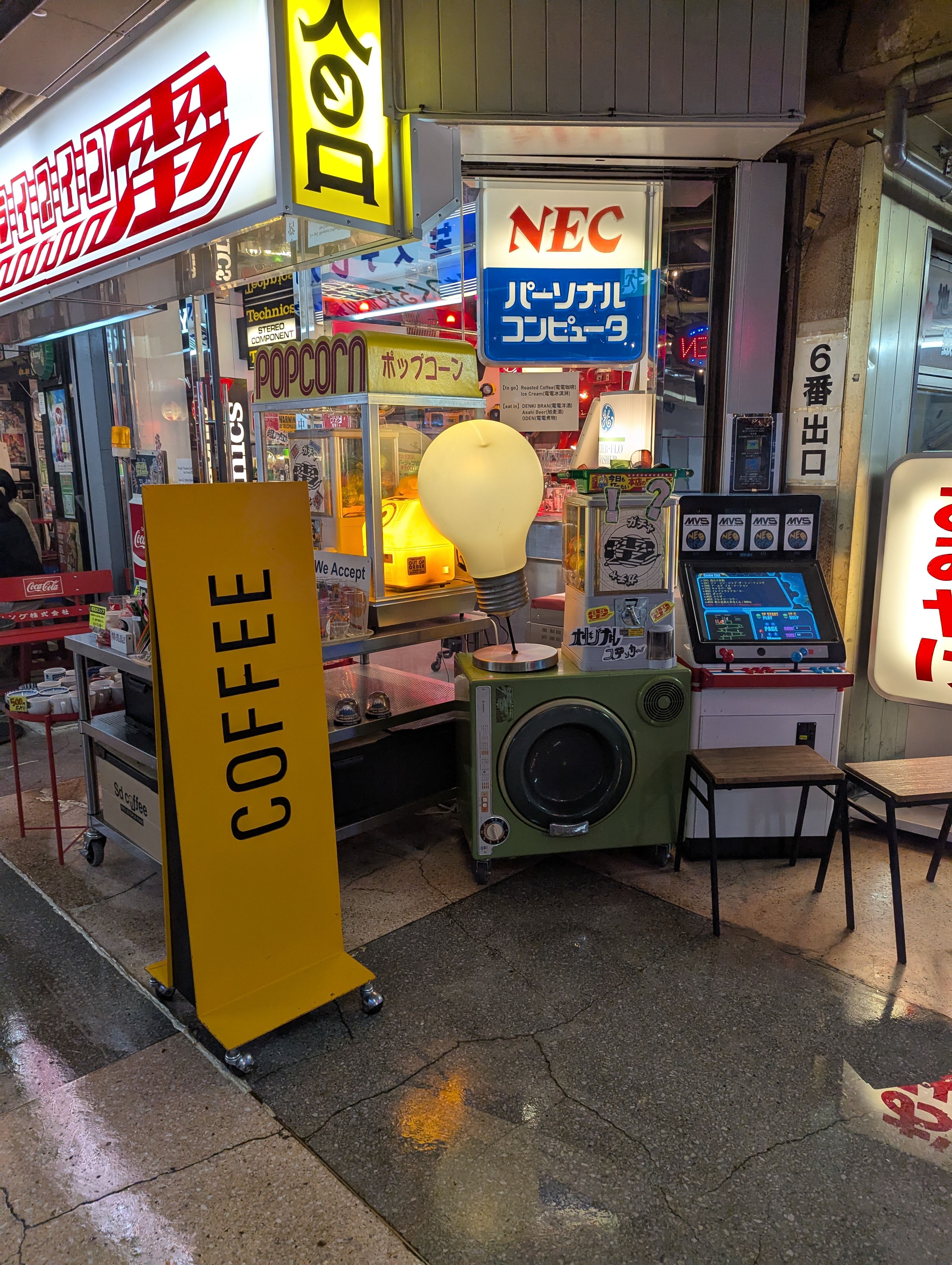 Colorful Tokyo Street Scene with Coffee Sign