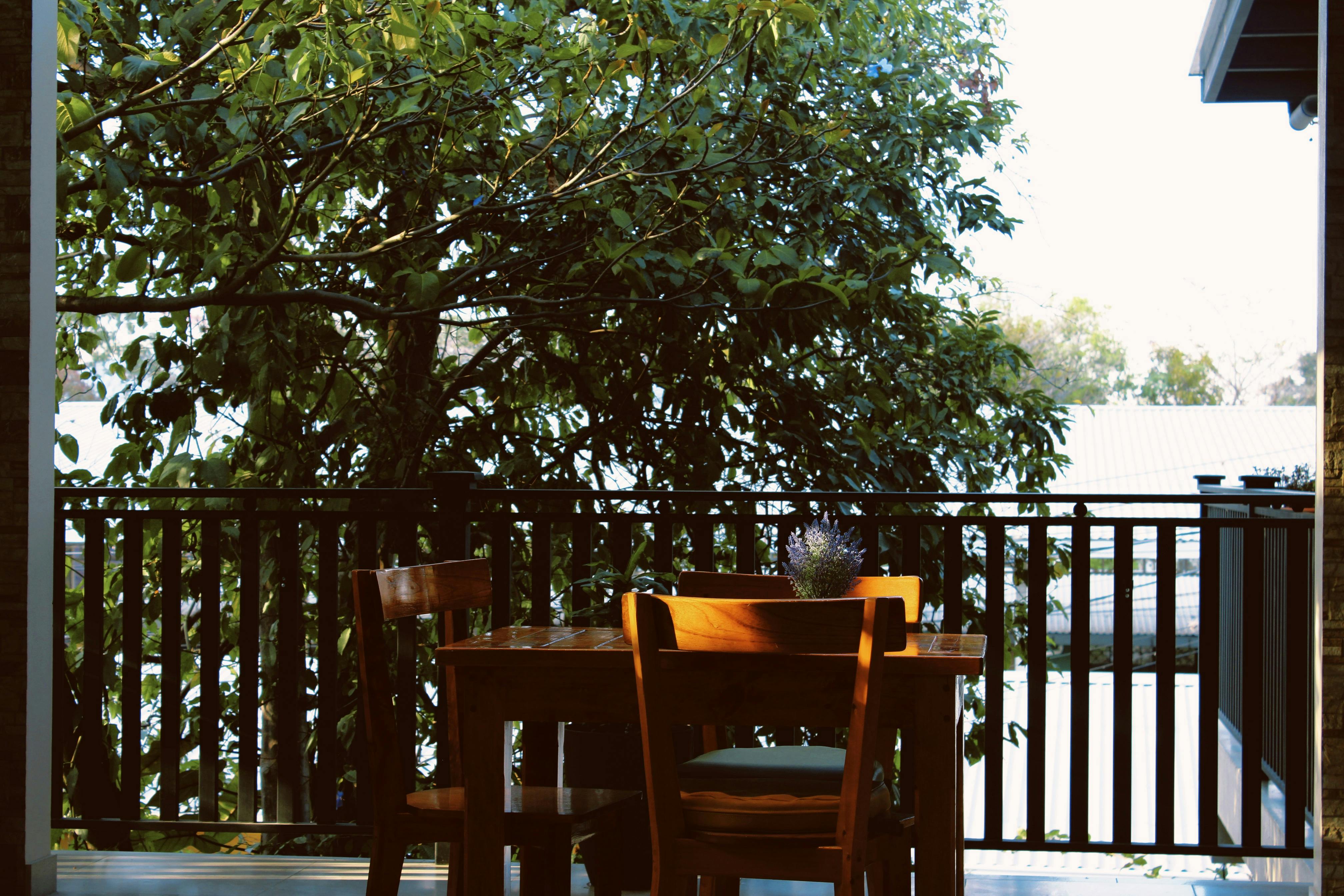 Close-up of a compact, lightweight foldable table for outdoor balcony use