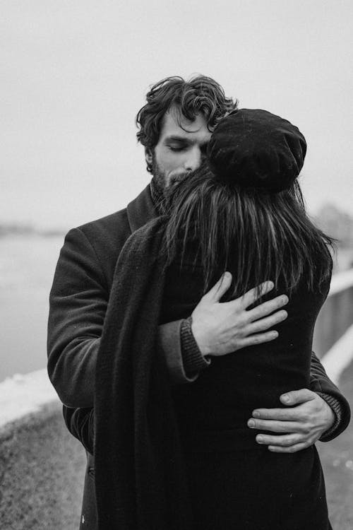 Free Man and Woman Hugging Each Other Stock Photo