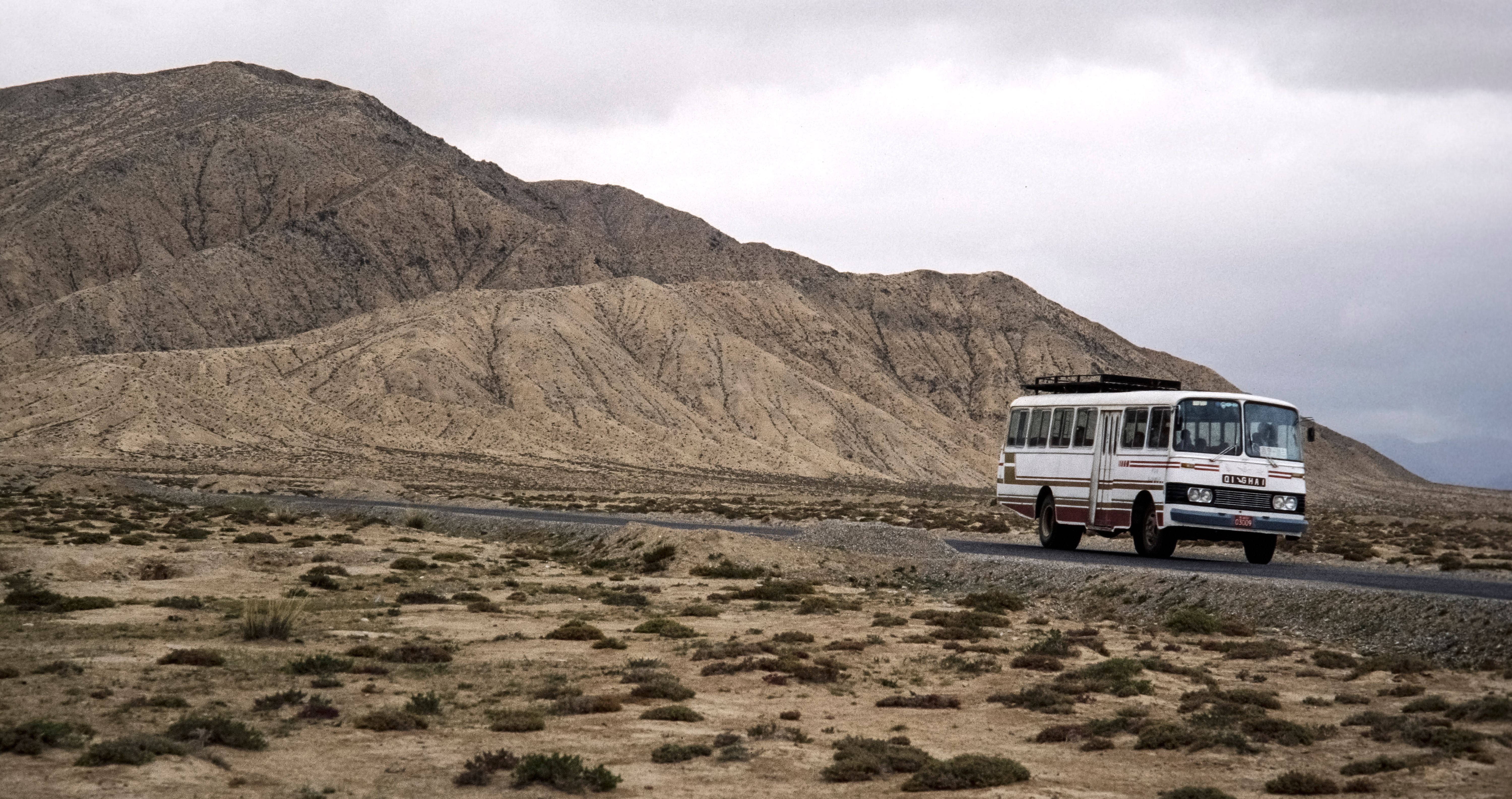 Lonely Bus on Desert Road in Rural China · Free Stock Photo