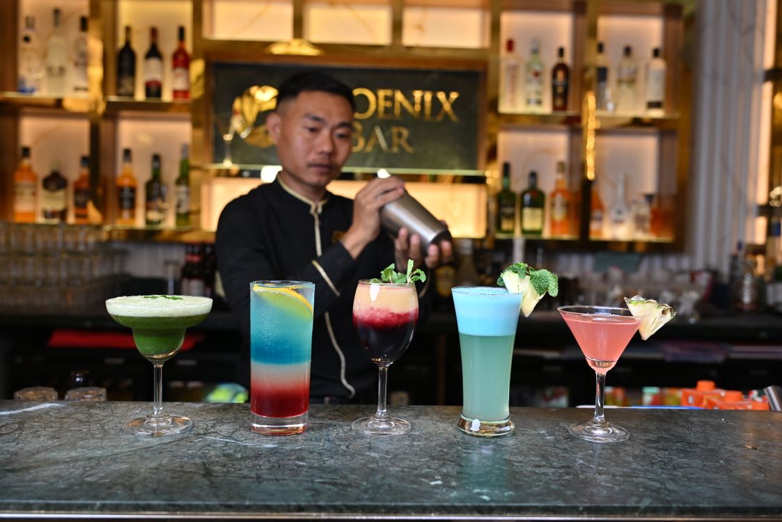 Phoenix Spring Goa Bartender Crafting Cocktails at Phoenix Bar in Goa · Free Stock Photo