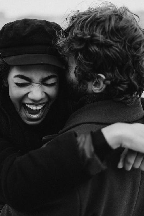 Free Gray Scale Photo of Smiling Woman Stock Photo