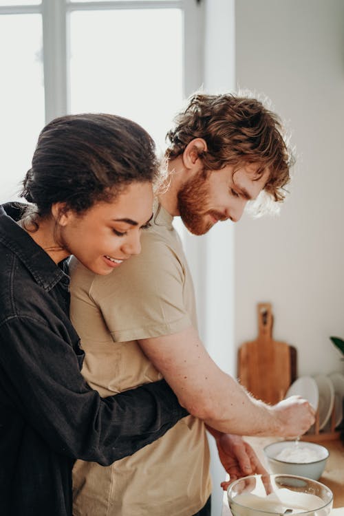 Free Photo Of Woman Hugging Man  Stock Photo