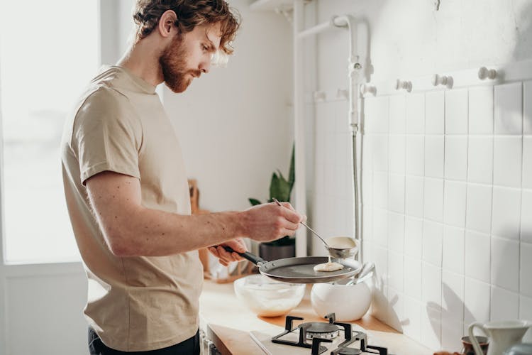 Man Cooking Pancakes 