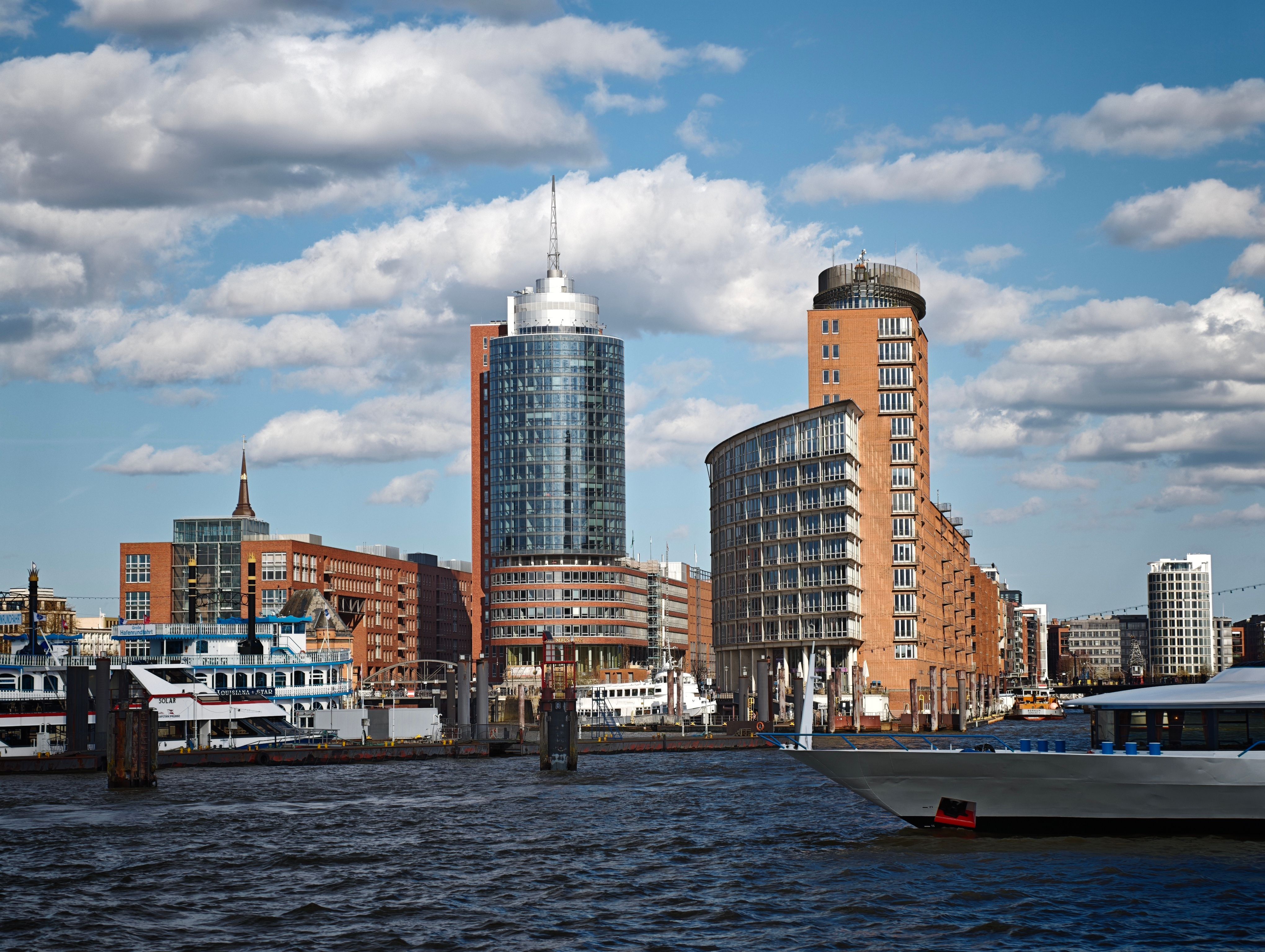 Modern Cityscape With Waterfront Buildings