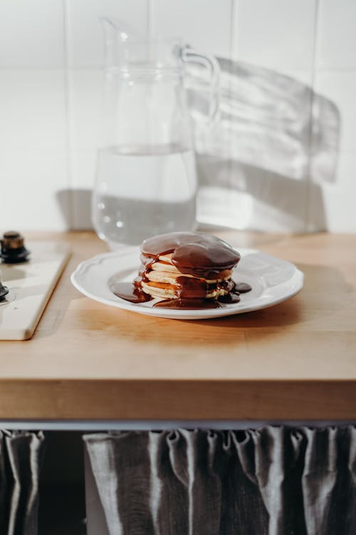 Gratis lagerfoto af bord, chokolade, chokoladesirup