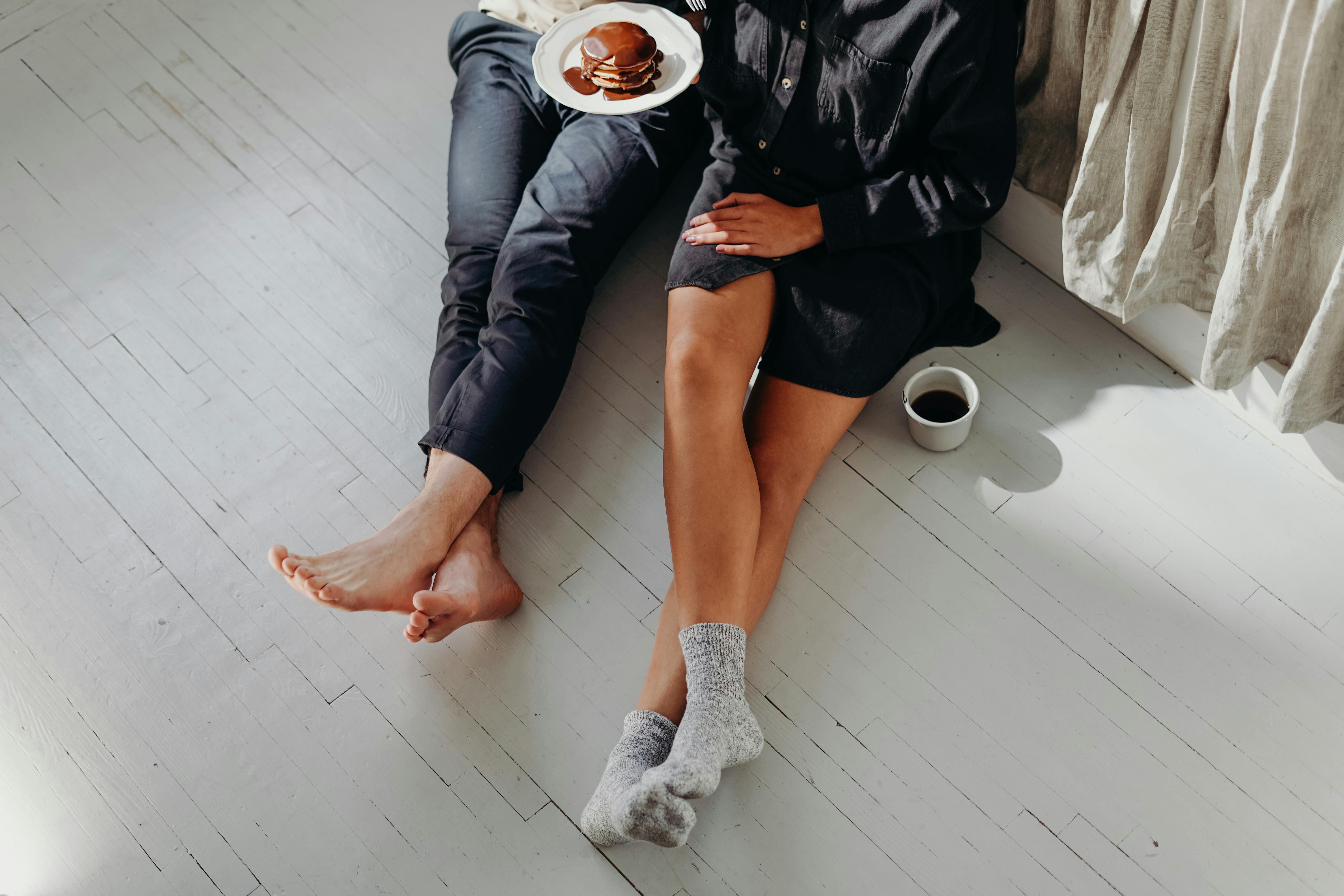 Free A Couple Having Breakfast On The Floor Stock Photo