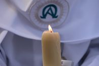Close-up of a candle during Semana Santa procession in El Puerto de Santa María, Spain.