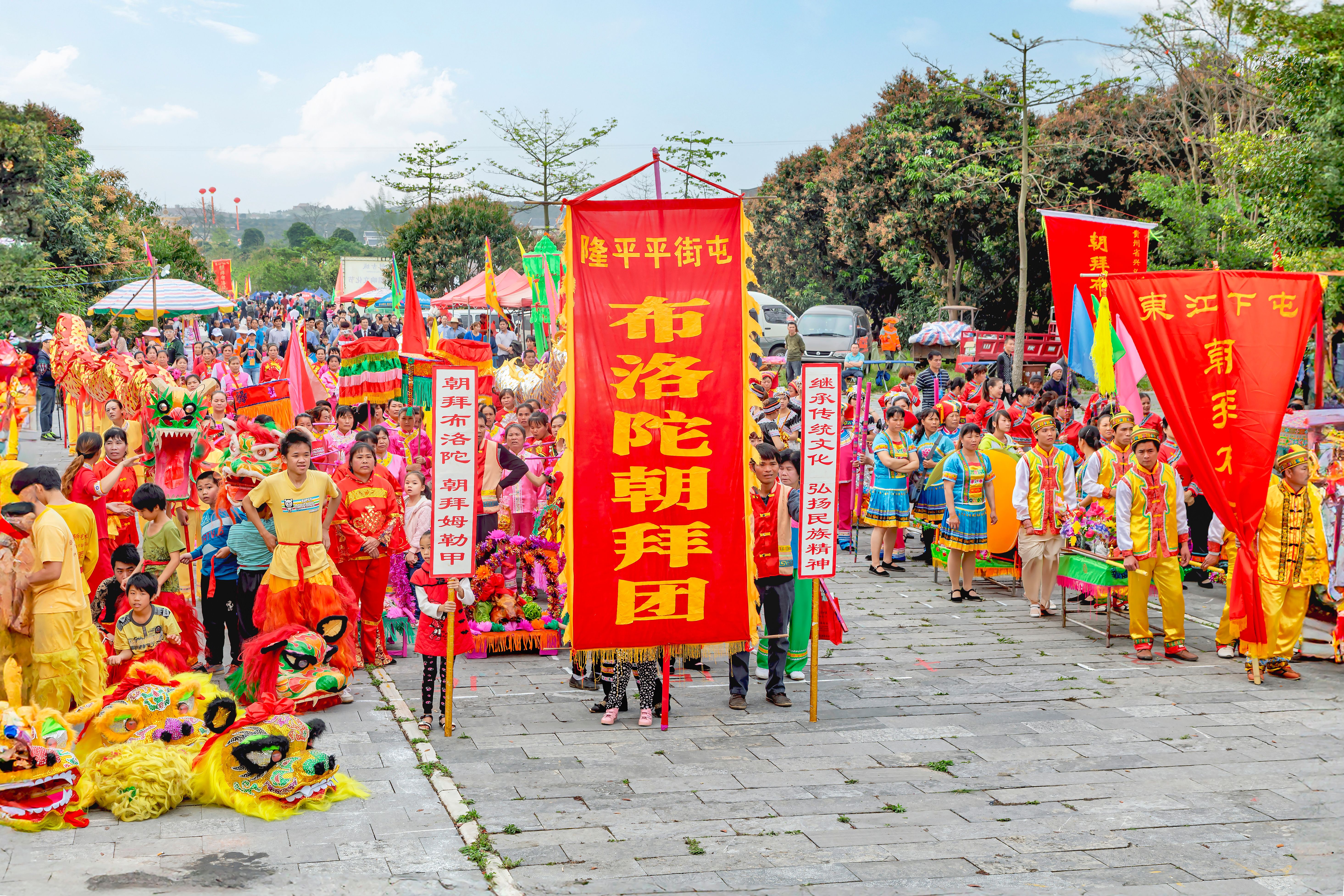 Vibrant Traditional Parade in Guangxi, China · Free Stock Photo