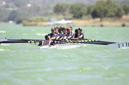 People Riding Boat on Water