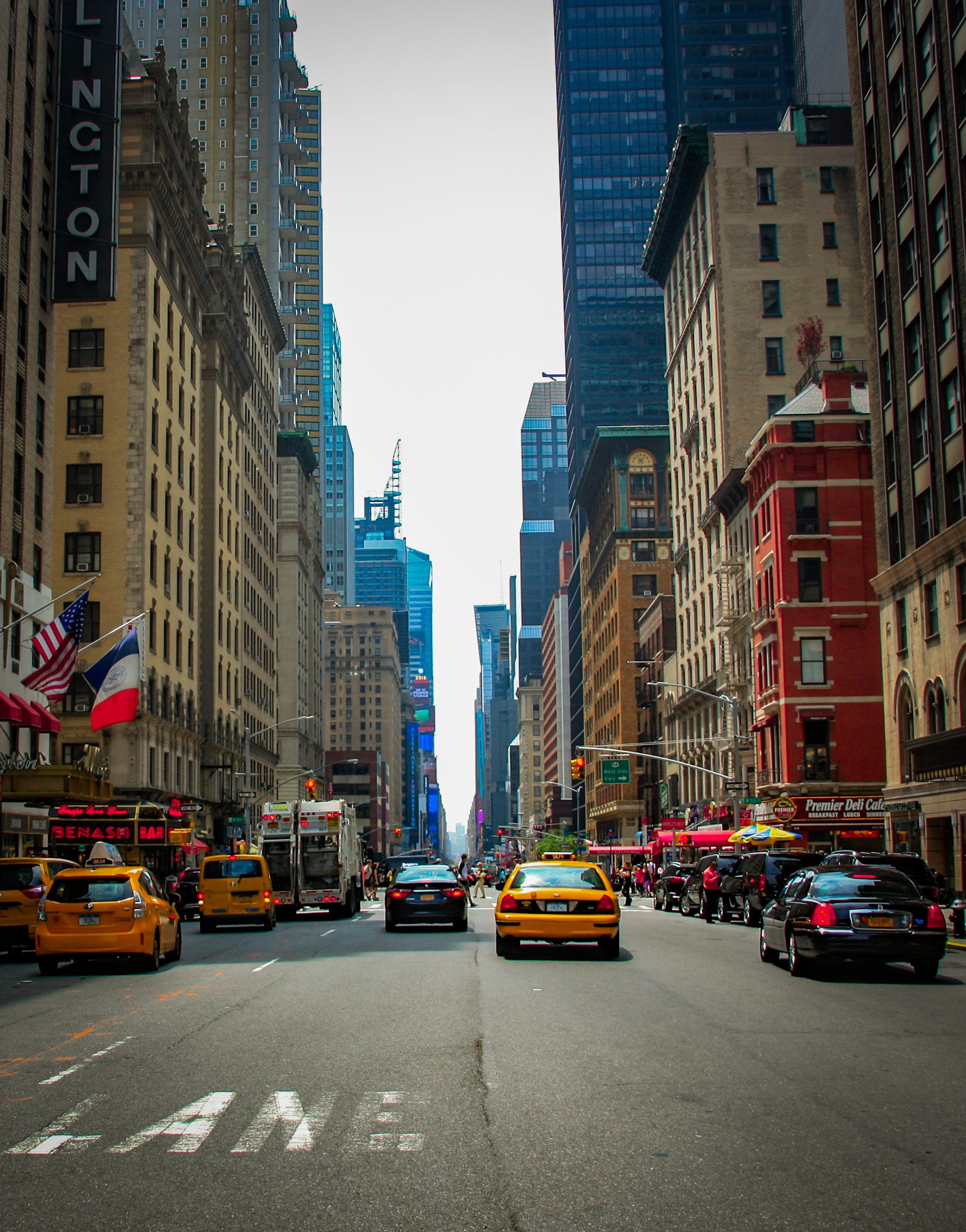 Vibrant New York City Street with Yellow Cabs · Free Stock Photo