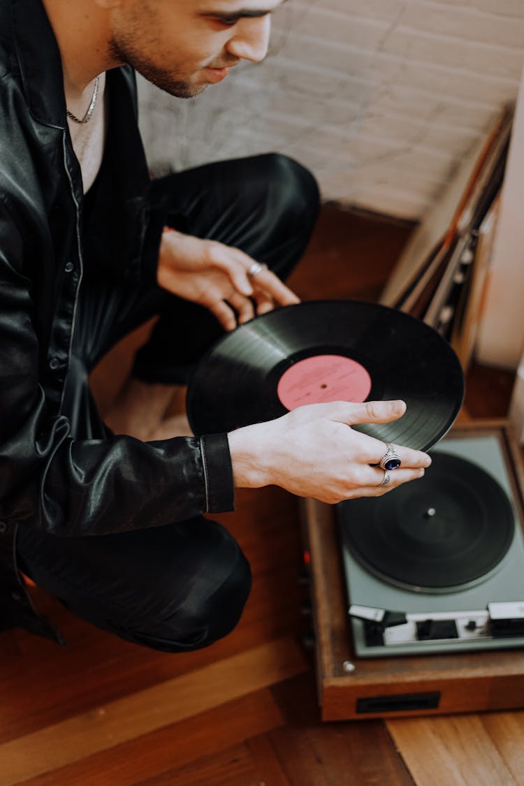 Man Holding Vinyl Record