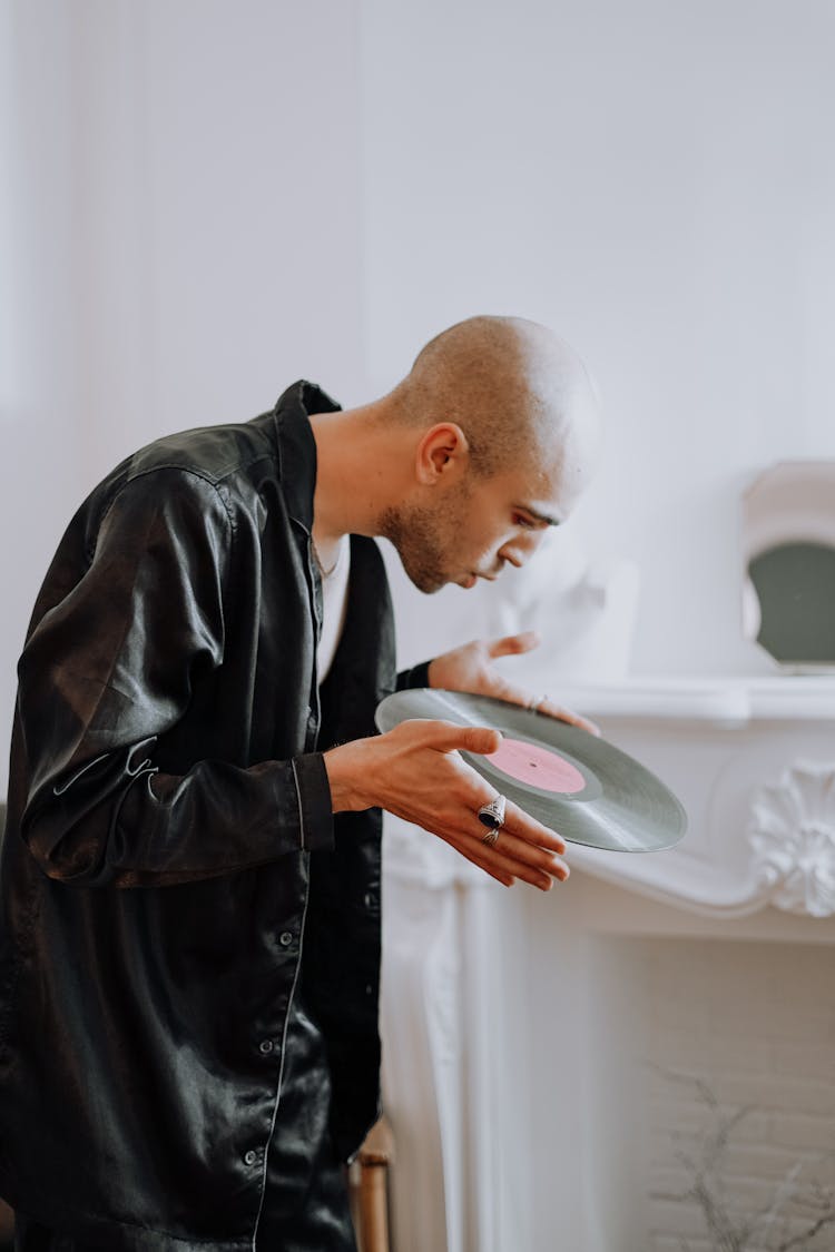 Man Holding A Vinyl Record