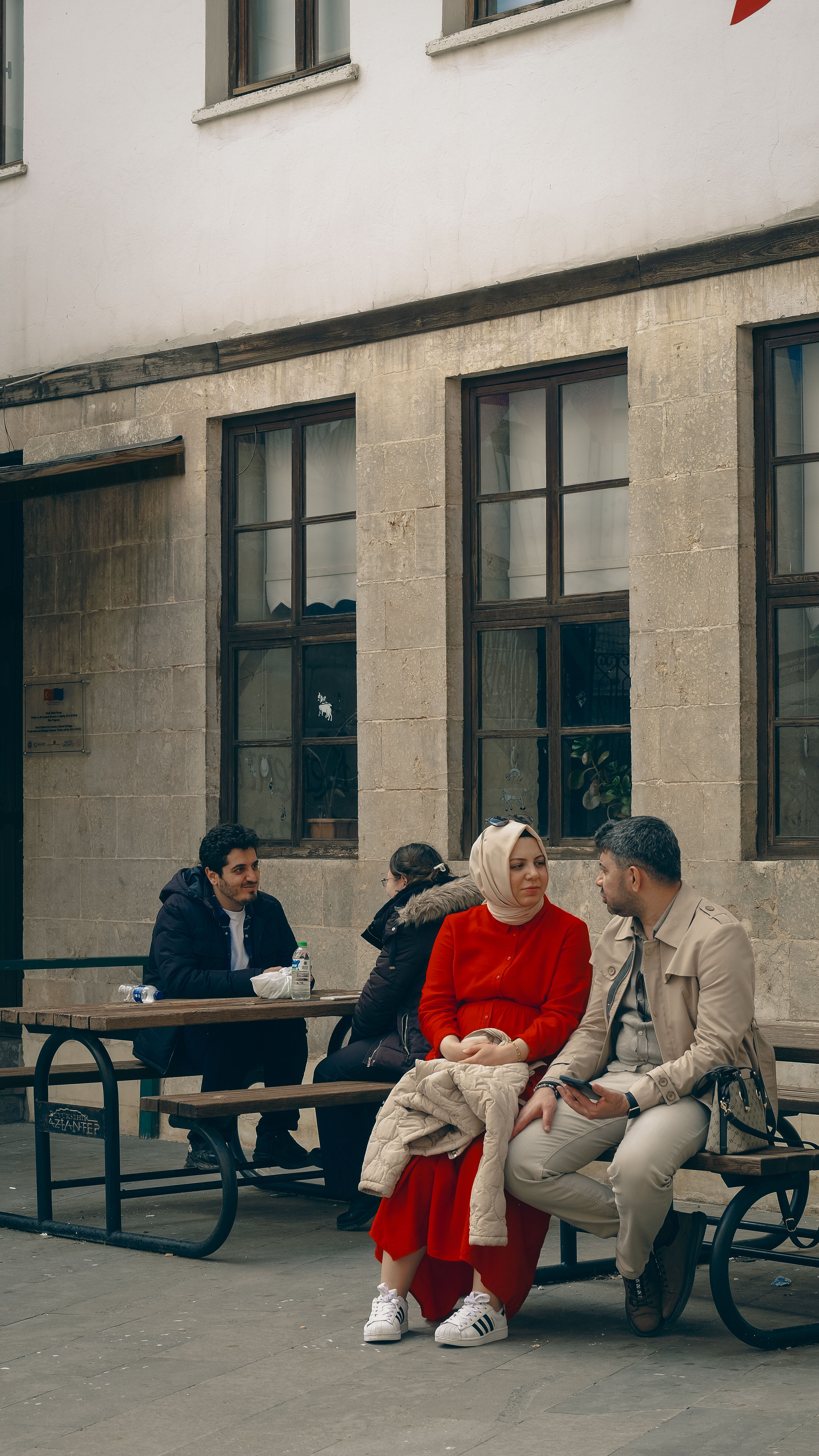 couple smiling while using smartphone for online dating