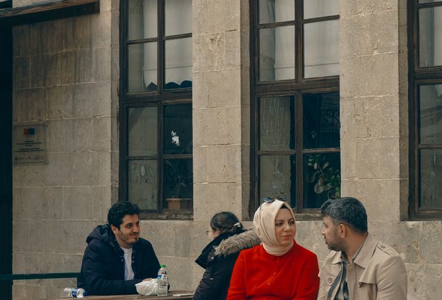 couple smiling while using smartphone for online dating