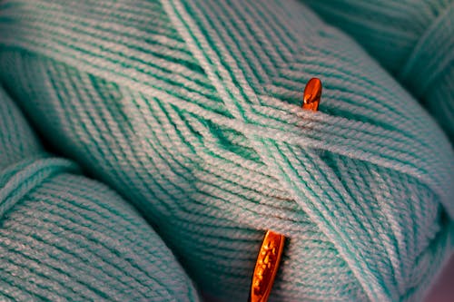 Close-Up Photo of Teal Yarn