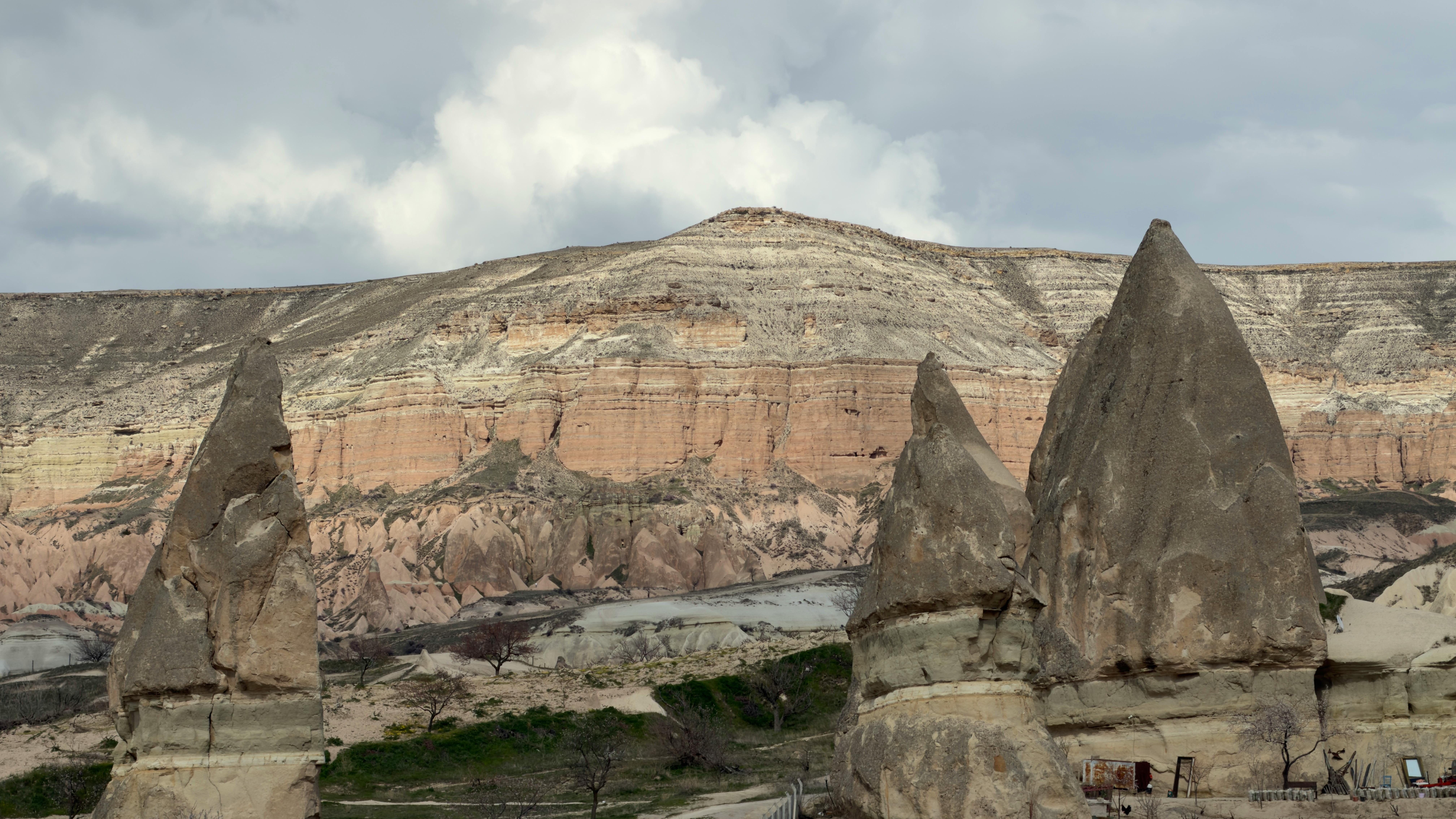 Captivating view of unique rock formations known as fairy chimneys in Cappadocia, Türkiye.