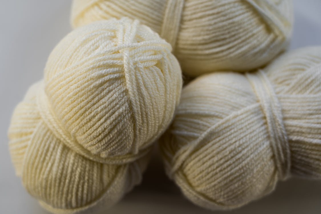 Close-Up Photo of Ivory Yarn