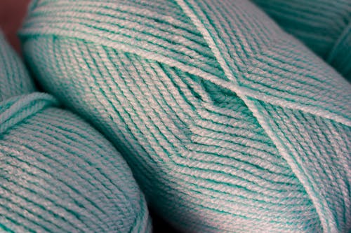 Close-Up Photo of Teal Yarn