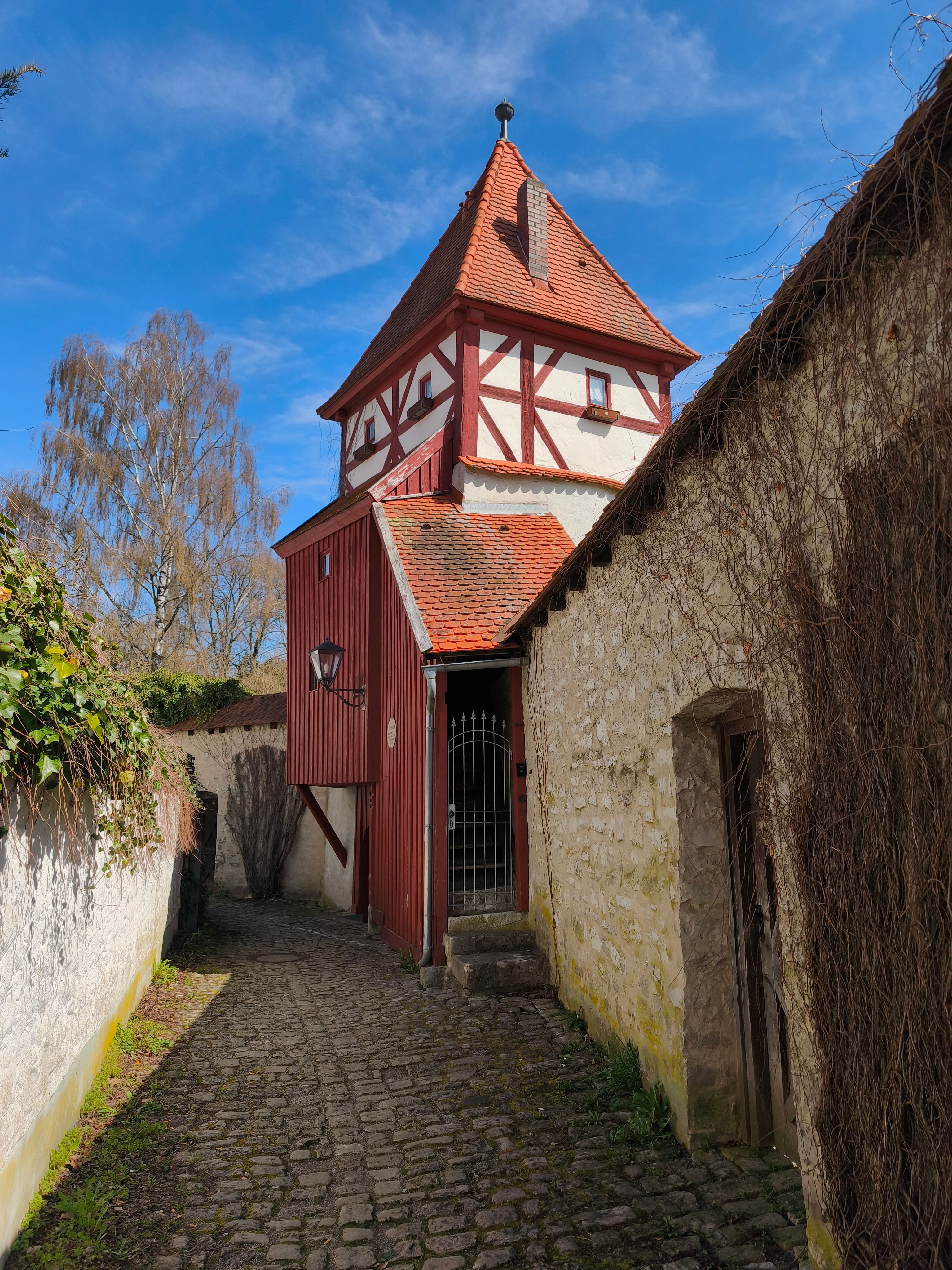 Charming Medieval House on Cobblestone Pathway · Free Stock Photo