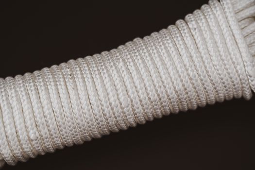 White Rope on Black Surface