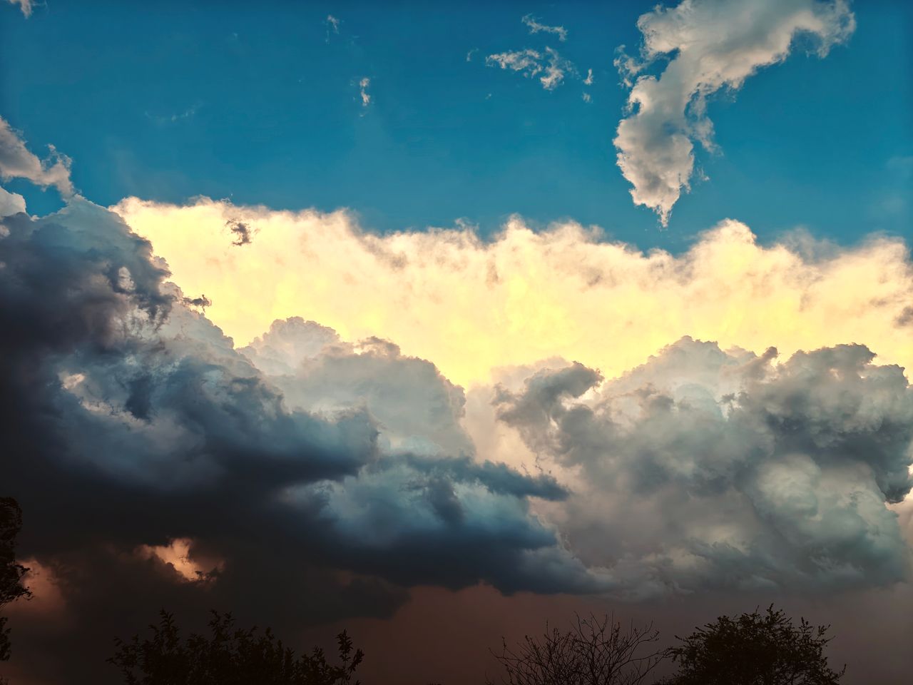 a stunning display of contrasting clouds during sunset in koraon uttar