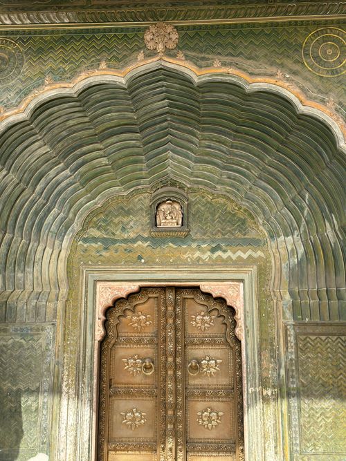 Free Detailed view of a beautifully ornate arch and carved door in Jaipur, India. Stock Photo