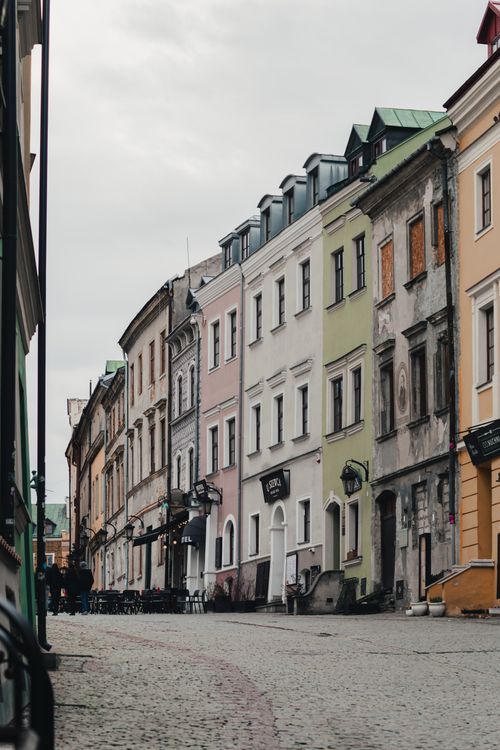 Free Historic architecture and cobblestone street in Lublin's picturesque Old Town. Stock Photo