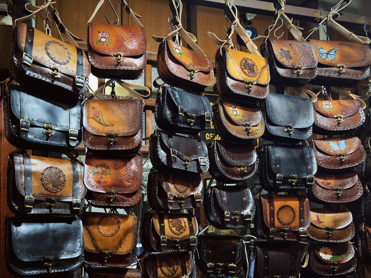 Handcrafted leather bags with artistic designs
