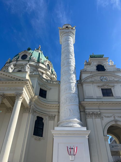 Free Dramatic angle of Karlskirche with blue sky backdrop in Vienna, Austria. Stock Photo
