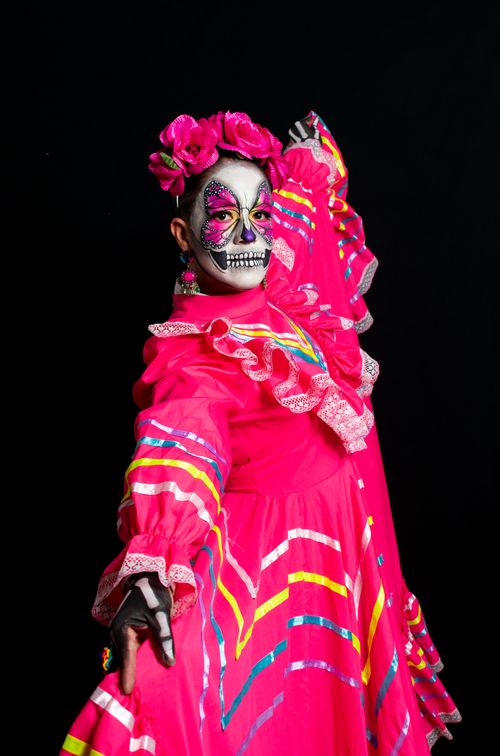 Free Colorful Catrina costume with skull makeup highlighting Mexican culture and tradition in Toluca, Mexico. Stock Photo