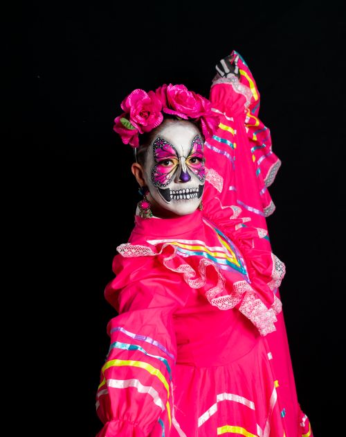 Free Colorful Catrina costume and makeup embodying Day of the Dead traditions in Mexico. Stock Photo