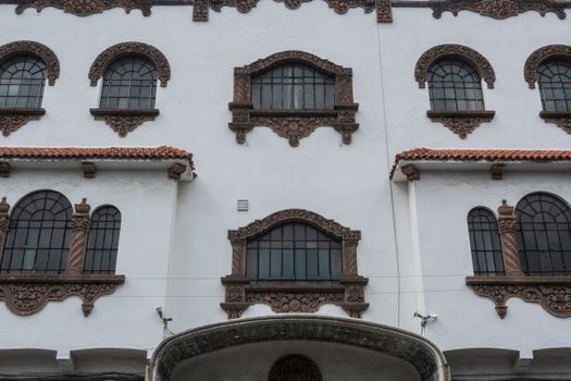 Detailed view of a historic colonial building in Toluca de Lerdo, Mexico.