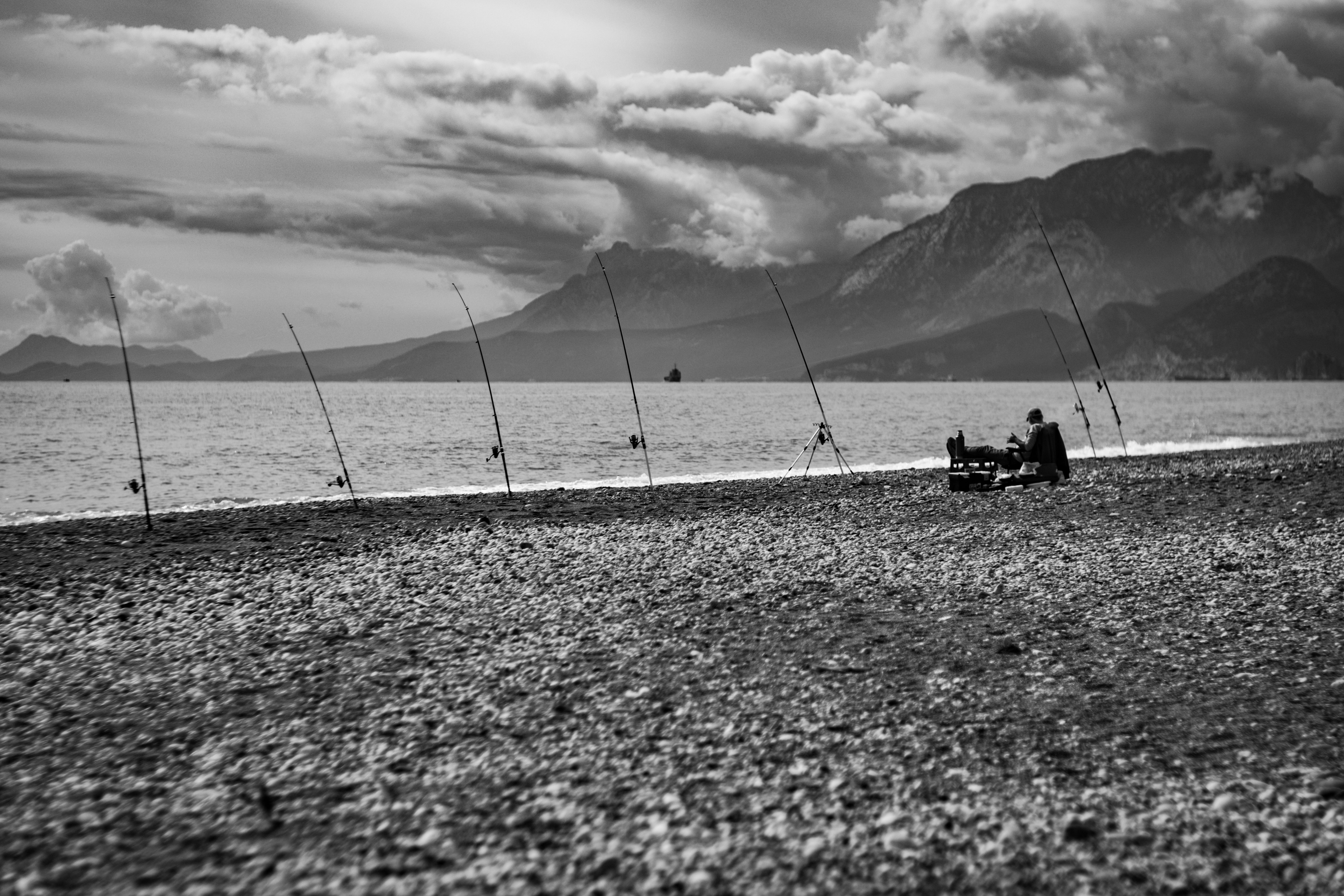 Black and White Beach Fishing Scene · Free Stock Photo