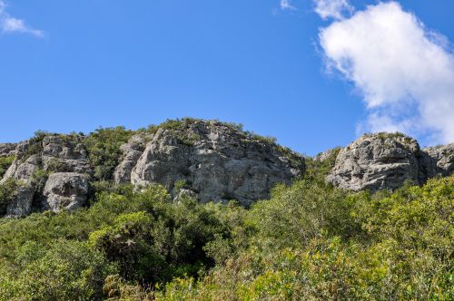 Free Scenic rocky hills and lush greenery in Lavalleja, Uruguay under vibrant blue skies. Stock Photo