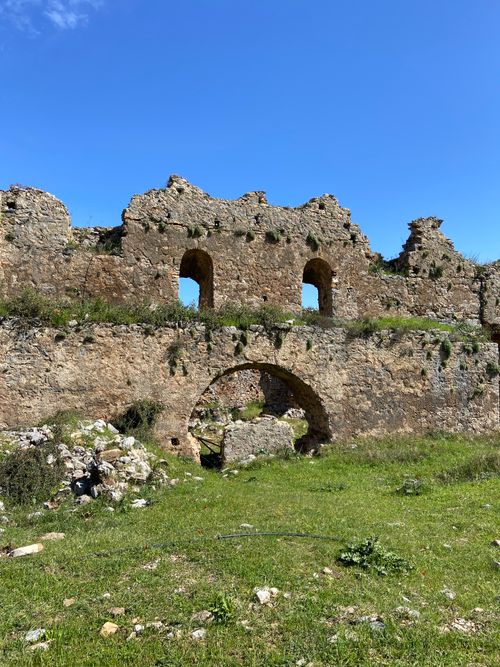 Free Explore ancient stone ruins under a clear blue sky, capturing timeless history. Stock Photo