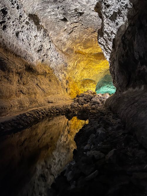 Free Explore the stunning rock formations inside a Lanzarote cave with vibrant lighting. Stock Photo