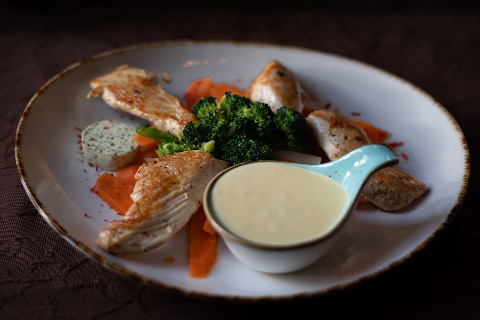 Healthy meal prep with chicken and fresh herbs