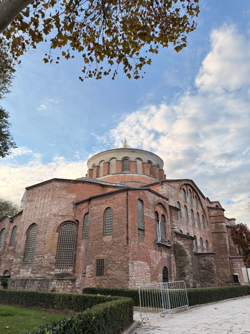 Free Ancient Byzantine church with iconic dome, located in Istanbul under a vibrant blue sky. Stock Photo