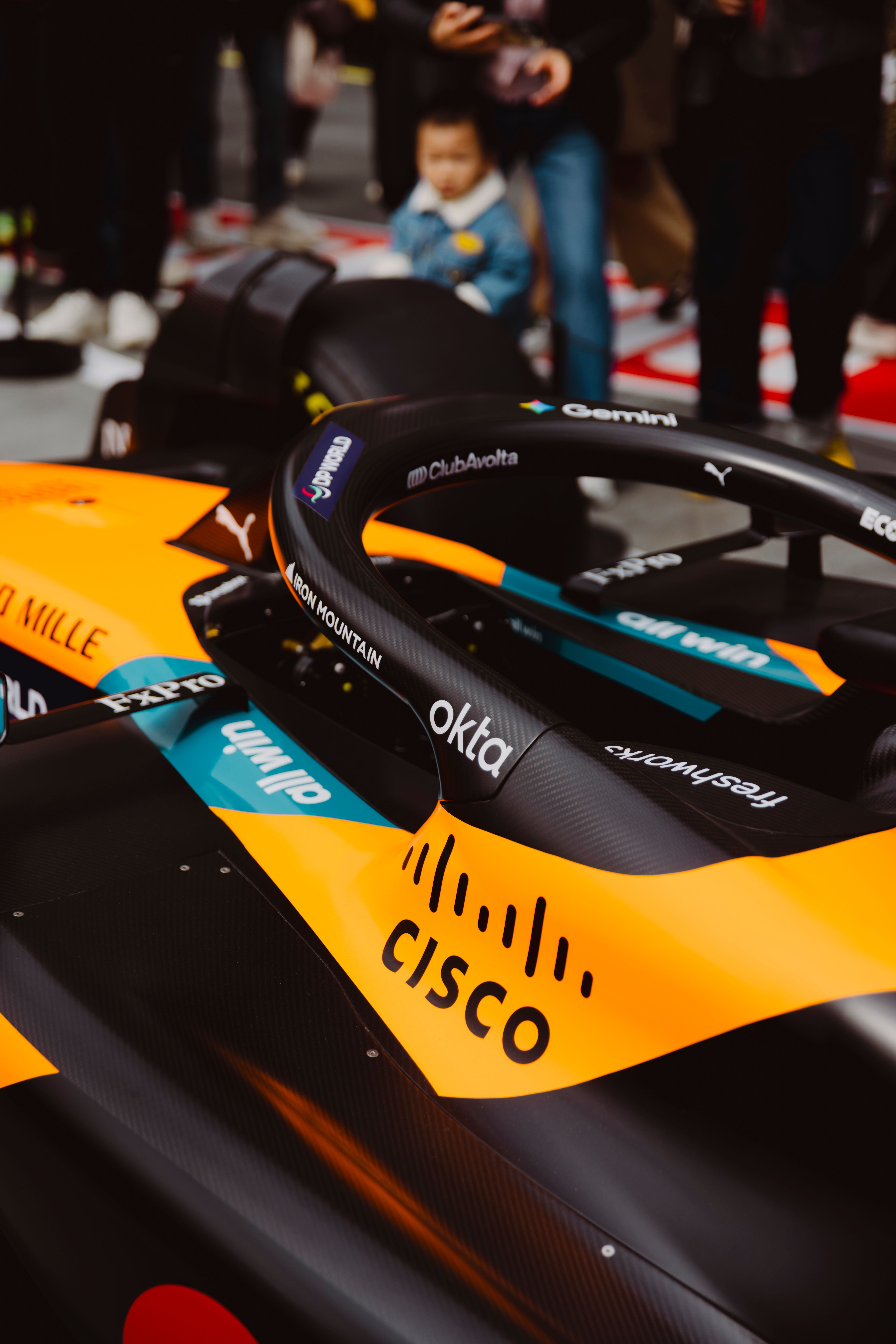 Close-up of Race Car Steering Wheel at Event · Free Stock Photo