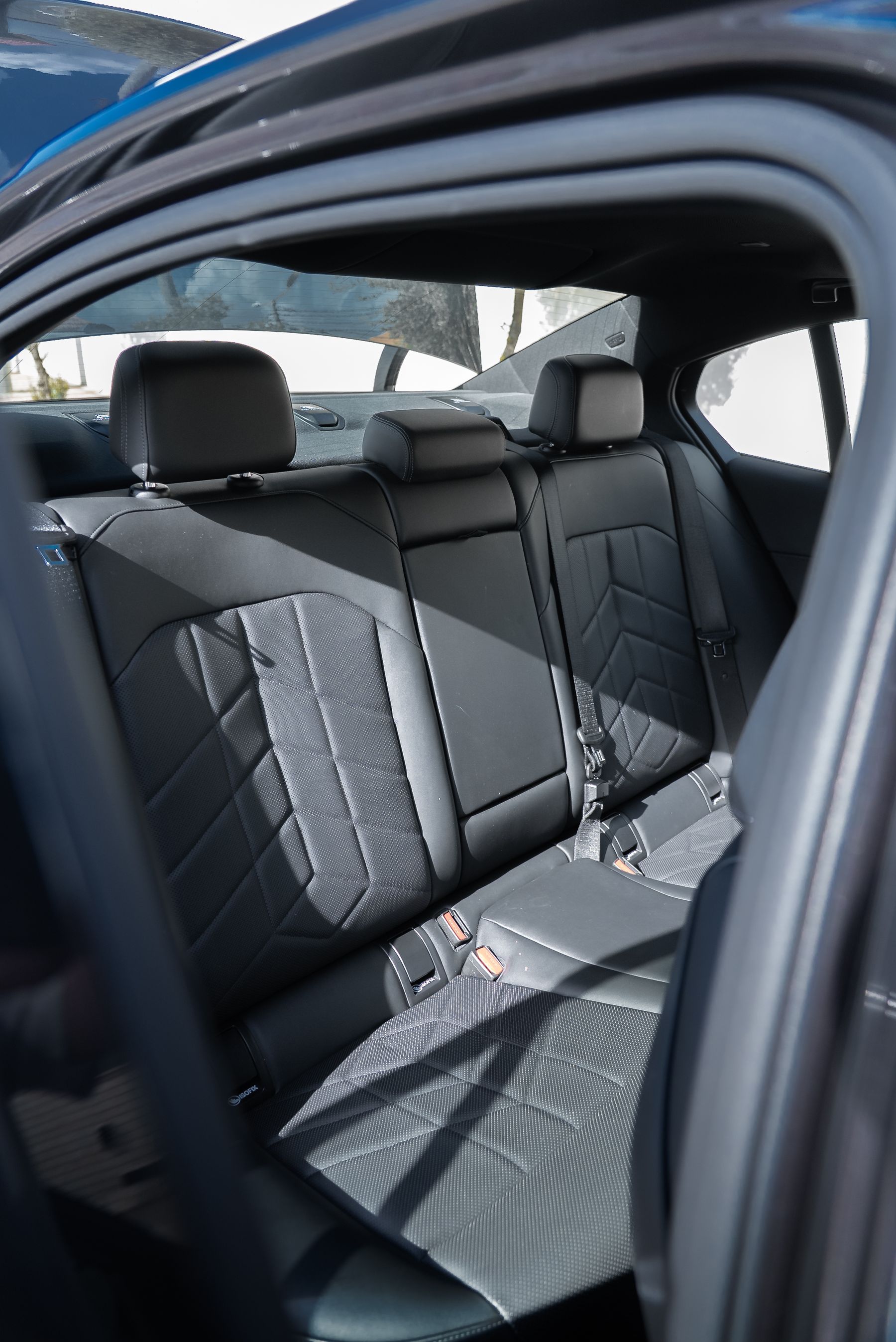 Dark luxury vehicle passenger interior